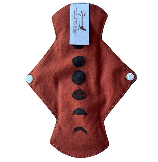 Brick Orange cloth pad with black Moon phase stamp