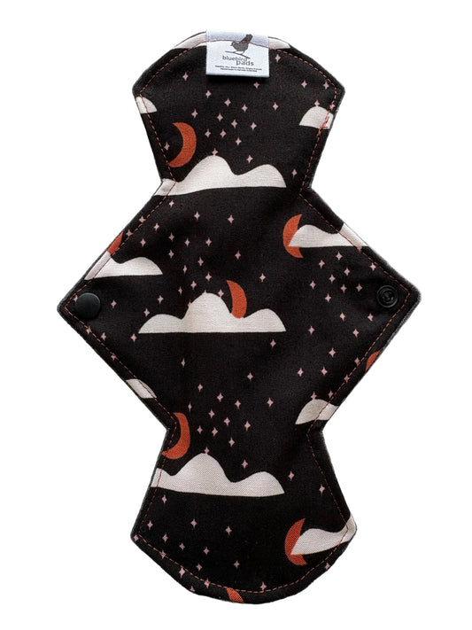 Reusable menstrual pad with Harvest moon and black background